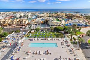 an aerial view of a resort with a pool and the ocean at Hotel Alay - Adults Only Recommended in Benalmádena