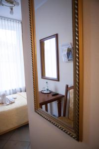 Postel nebo postele na pokoji v ubytování Hotel Baden