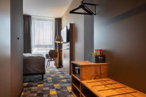 Posezení v ubytování Holiday Inn - the niu, Timber Esslingen by IHG