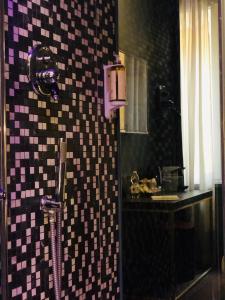 a bathroom with a shower and a sink at Saint B Boutique Hotel STB in Rome