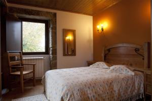 Säng eller sängar i ett rum på Casa Fonte Do Laboreiro