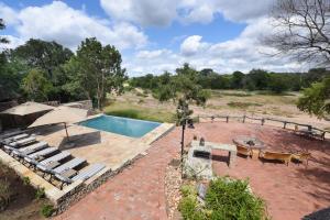 A view of the pool at Shumbalala Game Lodge or nearby