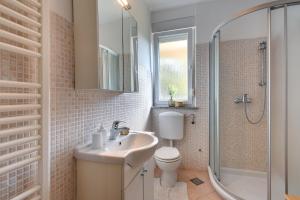 Ein Badezimmer in der Unterkunft Apartments Villa Delia