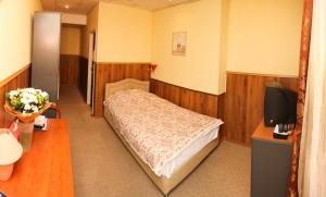 Cama o camas de una habitación en Fort Hotel