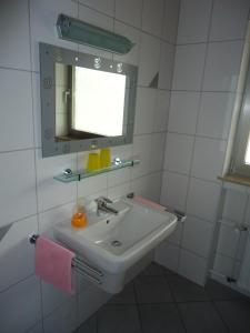 Koupelna v ubytování Hotel Leise Garni