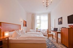 Postel nebo postele na pokoji v ubytování Hotel Brandies an der Messe