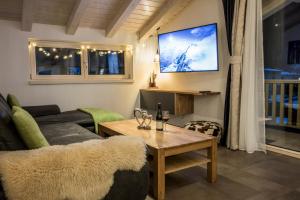 TV a/nebo společenská místnost v ubytování Haus Lukic