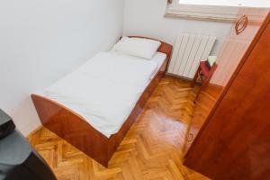 Posteľ alebo postele v izbe v ubytovaní Guesthouse Varnica