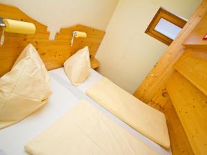 מיטה או מיטות בחדר ב-Appartements Popotnik