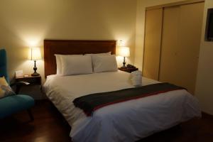 Katil atau katil-katil dalam bilik di Atrium Miraflores Hotel