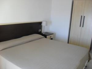 Postel nebo postele na pokoji v ubytování Hotel Solemar