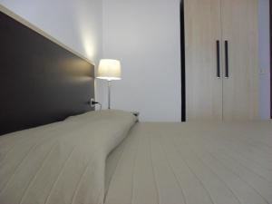 Postel nebo postele na pokoji v ubytování Hotel Solemar