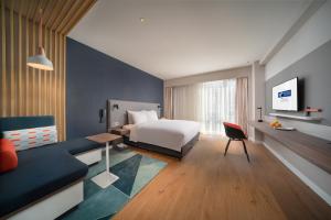 Postel nebo postele na pokoji v ubytování Holiday Inn Express Shanghai Huijin by IHG + 37 fotografií