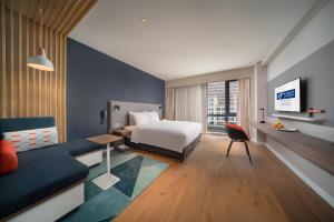Postel nebo postele na pokoji v ubytování Holiday Inn Express Shanghai Huijin by IHG