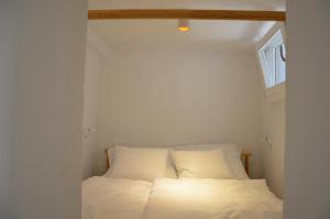 Postel nebo postele na pokoji v ubytování Apartments MartaMare