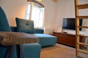 TV a/nebo společenská místnost v ubytování Apartments MartaMare