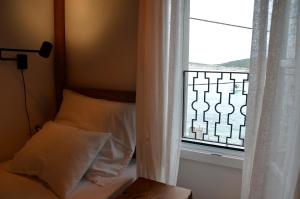 Postel nebo postele na pokoji v ubytování Apartments MartaMare