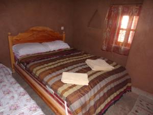 Katil atau katil-katil dalam bilik di Authentic riad & activities Erg