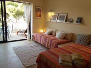 Gallery image of Ático Playa Santandria con Piscina y Wifi in Ciutadella