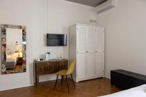 TV a/nebo společenská místnost v ubytování Seven Suites Pieve
