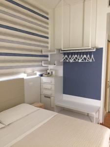Postel nebo postele na pokoji v ubytování Hotel Aristeo