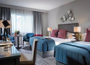 Voodi või voodid majutusasutuse Fairways Hotel Dundalk toas