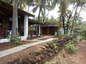a house with a walkway in front of it at Agonda Dream View in Agonda