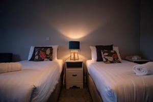 Letto o letti in una camera di Emmet Hotel