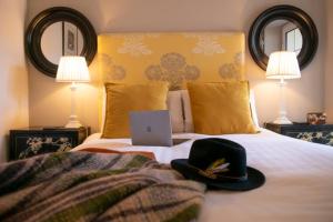 Letto o letti in una camera di Emmet Hotel