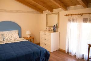 Letto o letti in una camera di Al Rustico