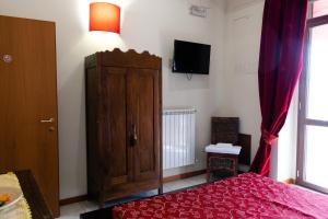 Letto o letti in una camera di B&B Muro Torto Lucera