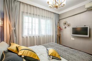 Katil atau katil-katil dalam bilik di Hangzhou Shangcheng District ·Locals Apartment· Xihu ·00144510