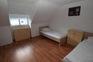 Postel nebo postele na pokoji v ubytování AB Apartment 06