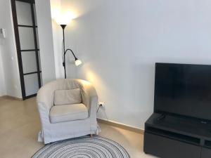A seating area at El Mocan Luxury Apartment
