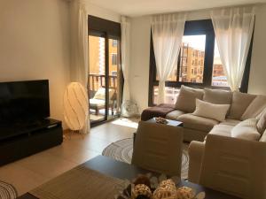 A seating area at El Mocan Luxury Apartment