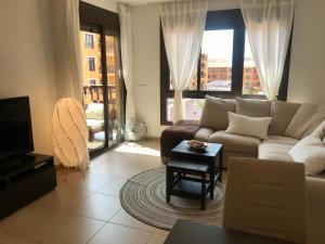 A seating area at El Mocan Luxury Apartment