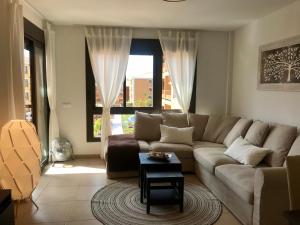 A seating area at El Mocan Luxury Apartment
