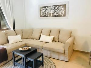 A seating area at El Mocan Luxury Apartment