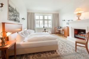 Postel nebo postele na pokoji v ubytování Hotel Brandies an der Messe
