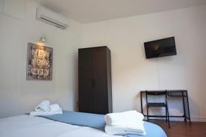 A bed or beds in a room at Sevi modern stay