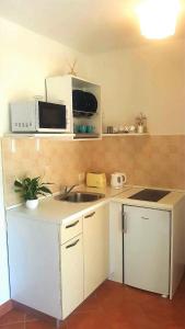 Kuchyňa alebo kuchynka v ubytovaní Studio Apartments Marra & Kech