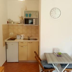 Kuchyň nebo kuchyňský kout v ubytování Studio Apartments Marra & Kech