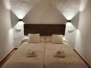 Postel nebo postele na pokoji v ubytování Finca El Chaparral + 37 fotografií