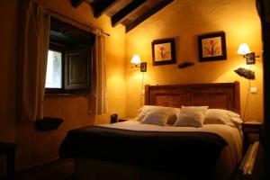 מיטה או מיטות בחדר ב-Los Pradones