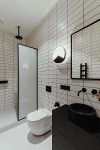 Kúpeľňa v ubytovaní Owntown Apart Hotel