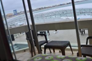 Balkón nebo terasa v ubytování Hotel Paradise Beach