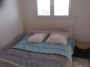 Postel nebo postele na pokoji v ubytování villa provençale STEVENSON