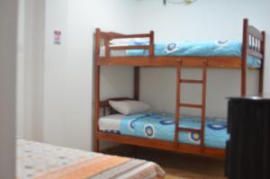 Postel nebo postele na pokoji v ubytování Hotel Paradise Beach