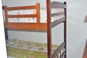 Postel nebo postele na pokoji v ubytování Hotel Paradise Beach