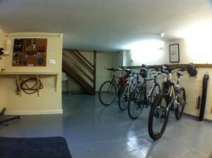 a group of bikes parked in a garage at Wayfarers Independent Hostel in Penrith